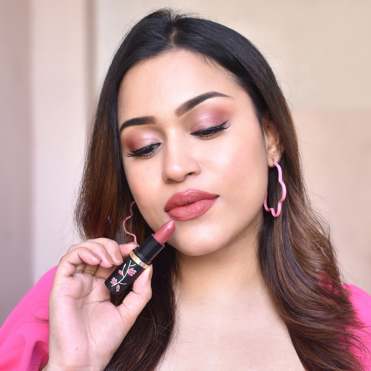 A Girl Applying Lipstick