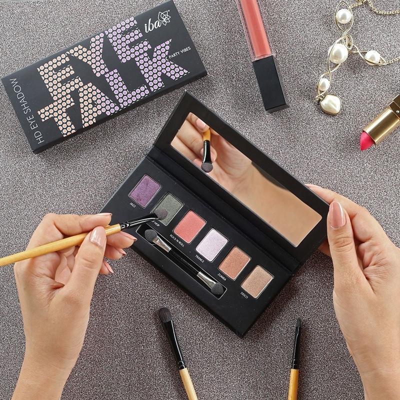 Women Catching Brush And Taking Out Eye Shadow