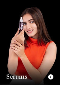 Woman holding a skincare serum with text 'Serums' on a black background
