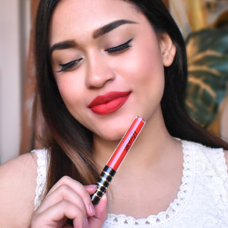 Women Displaying Iba Maxx Matte Liquid Lipstick – Perfect Red