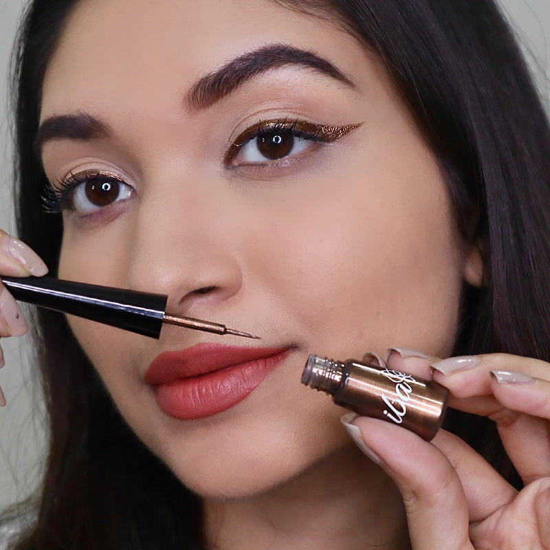 Women Displaying Iba Eye Talk Liquid Eyeliner